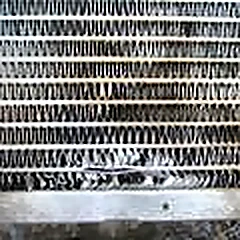 Fagure de radiator deteriorat, văzut de aproape